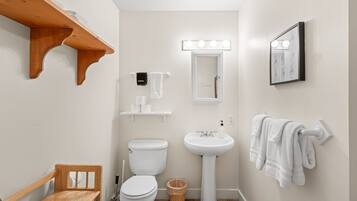 Shower, hair dryer, towels, shampoo