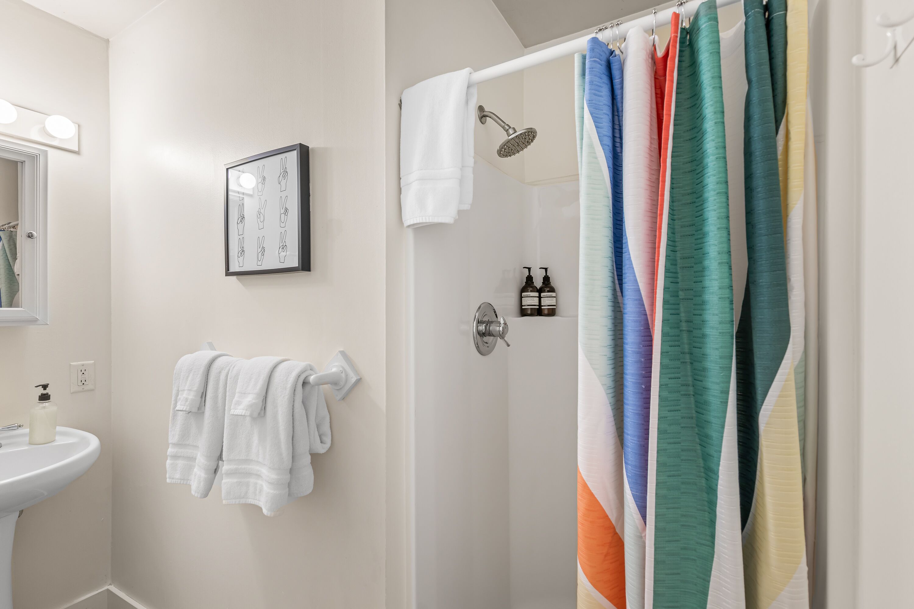 Shower, hair dryer, towels, shampoo