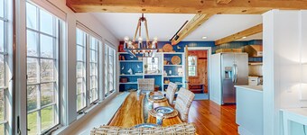 Elegant home right in town with gorgeous water view, deck & interior