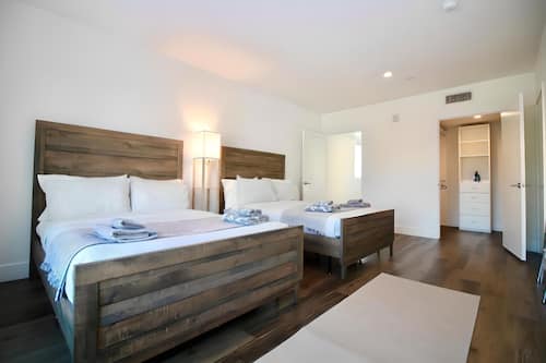 Two-Bedroom Suite with Balcony | Minibar, individually decorated, individually furnished, desk