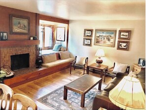 TV, fireplace, books, stereo