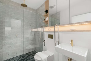 Shower, hair dryer, towels, shampoo
