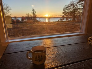Sit and enjoy the serene view from this cozy spot.