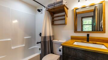 Hair dryer, towels, soap, toilet paper