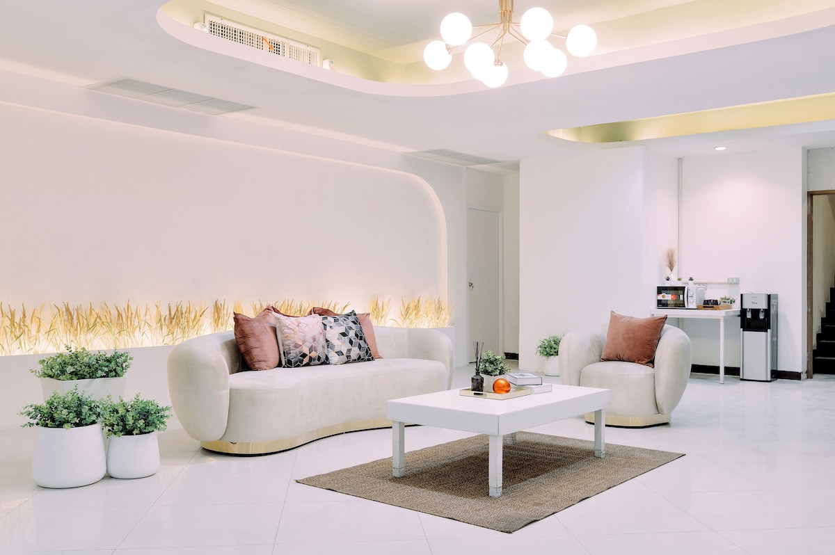 Soft curved lobby seating at Tori Crown Hotel