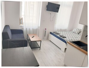 1 chambre, fer et planche Ă repasser, Wi-Fi, draps fournis