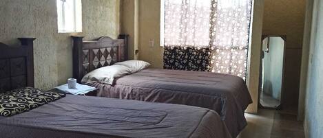 2 habitaciones y ropa de cama