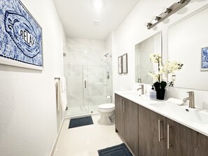 Hair dryer, towels, soap, shampoo