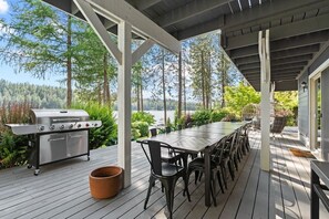Outdoor dining - Luxe Lake Home | Hot Tub + Private Dock & Beach (Nine Mile Falls)