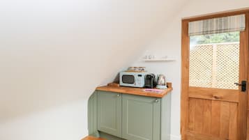 Fridge, electric kettle, toaster, cookware/dishes/utensils