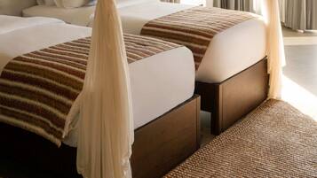 Egyptian cotton sheets, premium bedding, down duvets, memory-foam beds