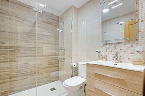 Bathtub, hair dryer, towels