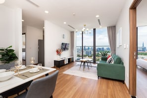 Premium Apartment, 3 Bedrooms, Balcony, City View | Living area | 42-inch Smart TV with satellite channels, pay movies