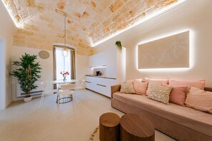 Traditional Condo, 1 Bedroom, Kitchenette, Mezzanine | Living area | Flat-screen TV - Palazzo Clemente (Monopoli)
