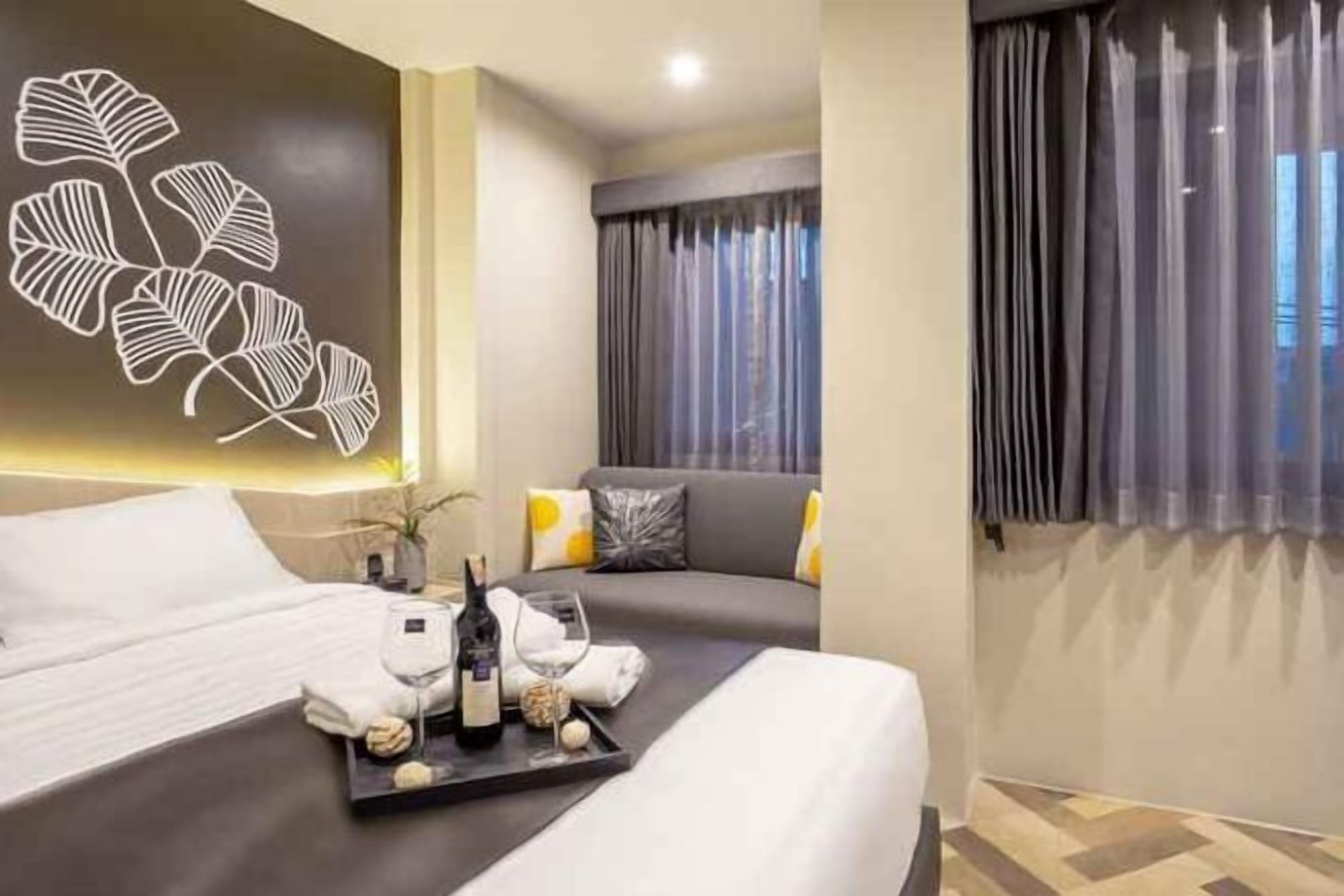 Premium bedding, Tempur-Pedic beds, desk, blackout drapes