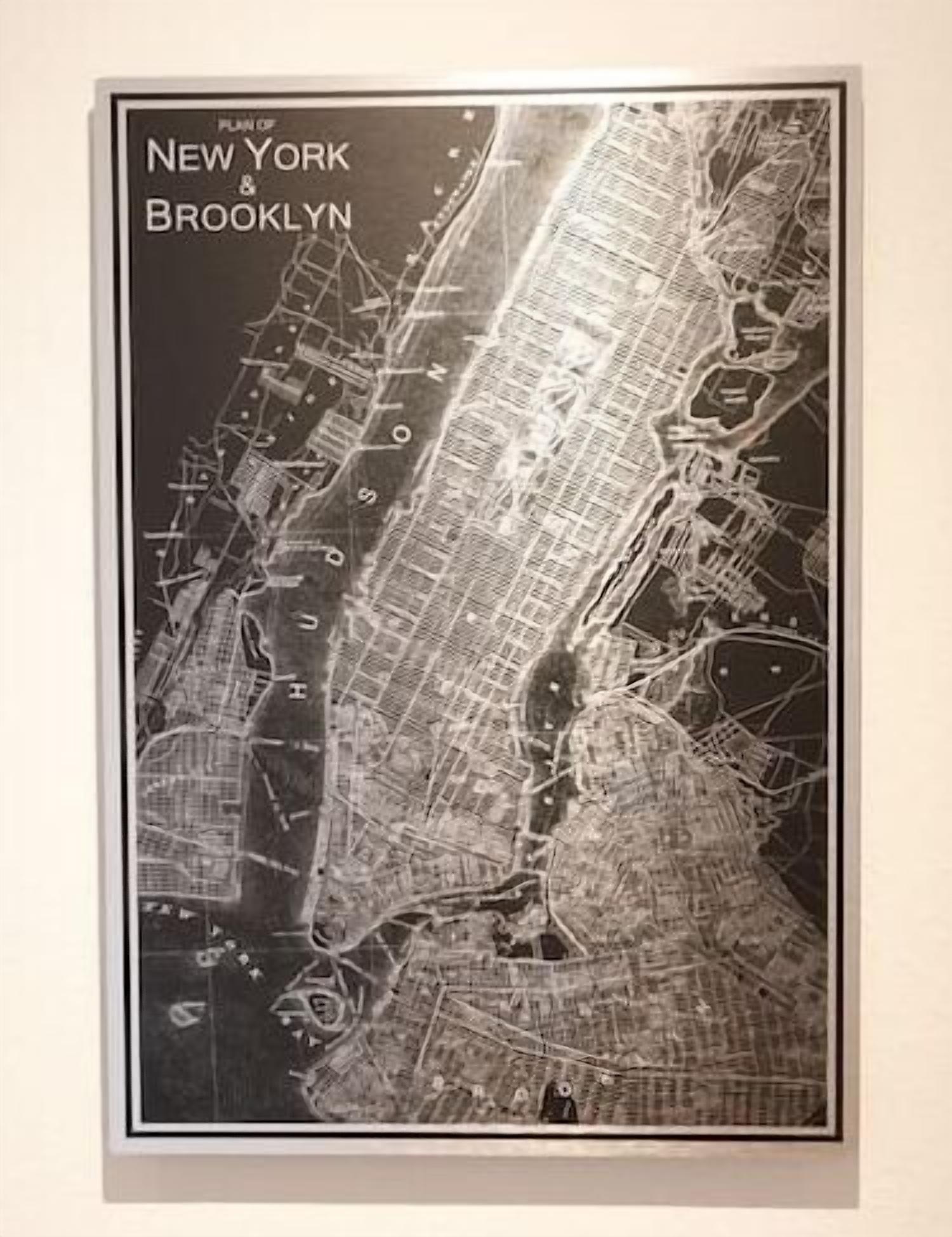 A black and white map of New York and Brooklyn with street layouts and landmarks.