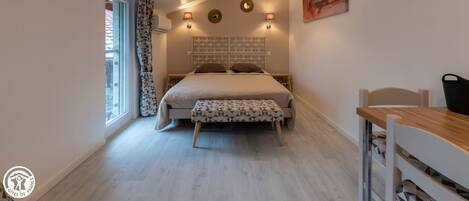 Iron/ironing board, travel crib, free WiFi, bed sheets