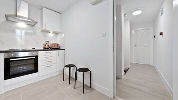 Studio | Private kitchen | Fridge, microwave, electric kettle