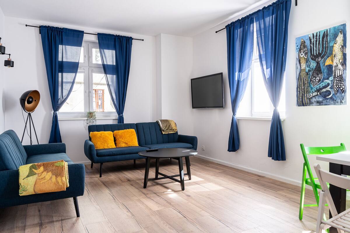 Comfort Apartment | Living area | 37-inch flat-screen TV with satellite channels, streaming services