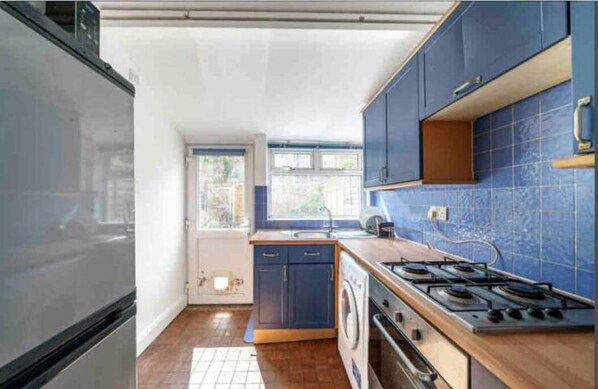 Fridge, microwave, electric kettle, dining tables