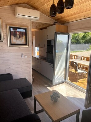 Living area - sunset cabin on the beach (Wapnica)