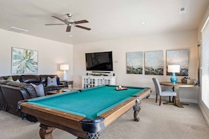 A pool table in a living room with a ceiling fan, a television, and artwork on the walls. - Redrock View #56: Hot Tub, Pool Table, Ping Pong + Paradise Village Waterpark! (Santa Clara)