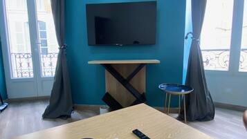 Comfort Apartment | Living area | 103-cm Smart TV with digital channels