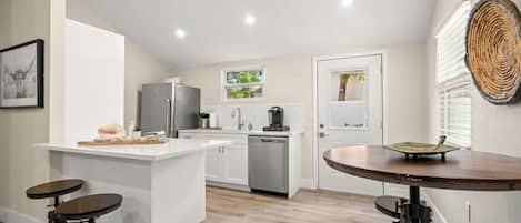 Coffee/tea maker, fridge, microwave, oven
