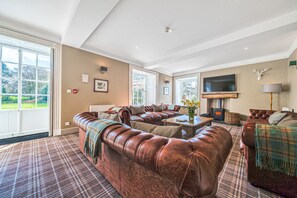 Smart TV, fireplace, DVD player, stereo - Orrest Head House, a majestic Lakeland property a moments walk from Windermere village. (Windermere)
