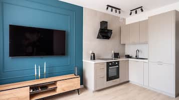 Appartement Confort | Coin cuisine privé | Réfrigérateur, plaque de cuisson, machine à expresso