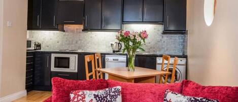 Classic Apartment | Private kitchen | Fridge, microwave, oven, stovetop