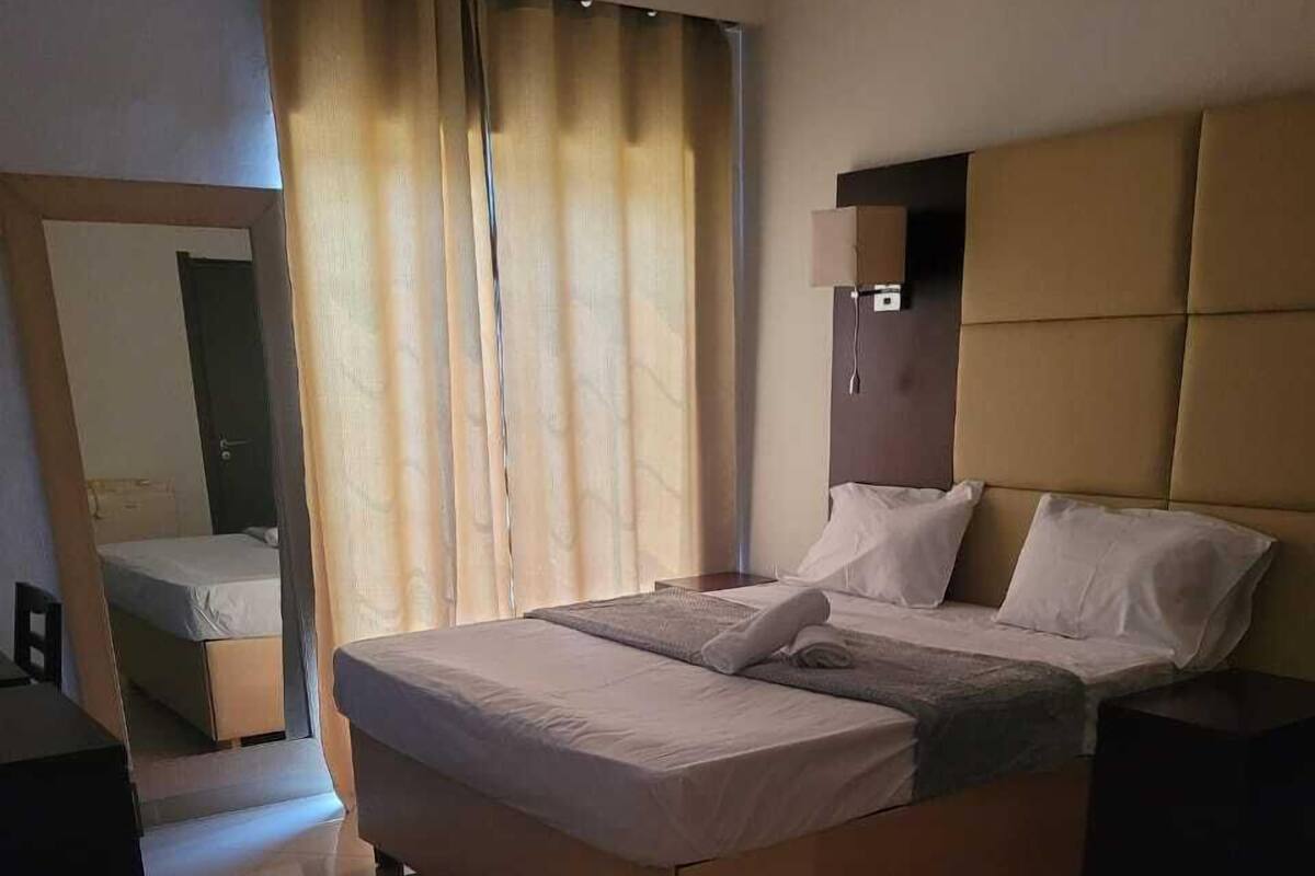 Desk, laptop workspace, WiFi (free), bed sheets
