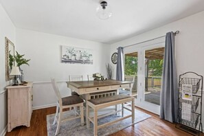 Enjoy meals with family and friends at the dining table, surrounded by a beautiful view.