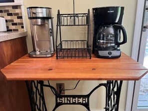 Enjoy a convenient kitchen with a coffee maker and water dispenser.