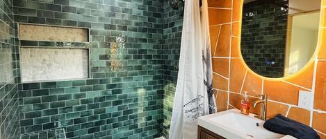 Shower, hair dryer, towels, soap