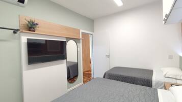 Apartamento | 2 quartos, escrivaninha, espaço de trabalho para notebook