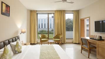 Kamar Double Premium, 1 Tempat Tidur King | Tempat tidur Select Comfort dan ruang kerja ramah laptop