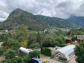 Surrounded by lush forest, this village offers a serene mountain retreat.