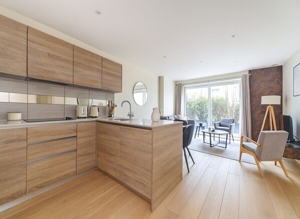 Apartment | Private kitchen | Fridge, oven, stovetop, dishwasher