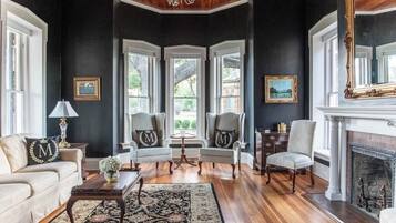 House, Multiple Beds, Patio (524 Austin St- Combo) | Living area | Fireplace