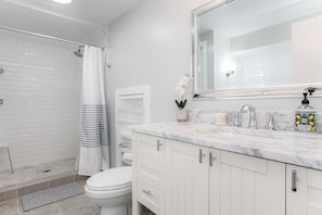 Hair dryer, towels, soap, shampoo
