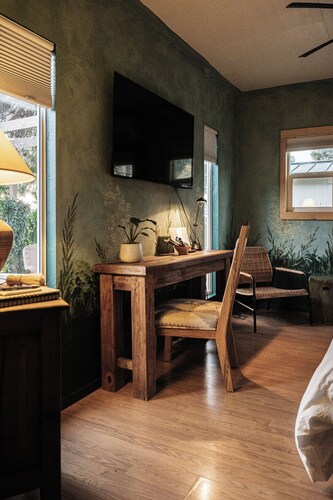 A boutique-hotel-style suite with a private entrance, tucked into our wild garden landscape.