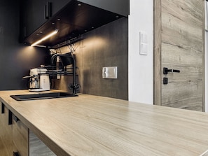 Fridge, stovetop, coffee/tea maker, toaster