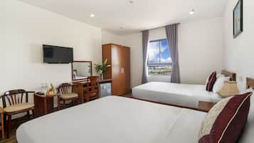 Superior Quadruple Room, City View | Premium bedding, minibar, individually decorated, desk