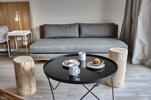 Studio (B) | Living area | 50-inch Smart TV with cable channels, Netflix, streaming services