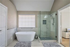 Shower, hair dryer, towels, soap