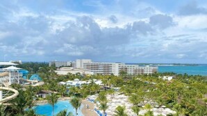A resort with a pool, beach, and water park.