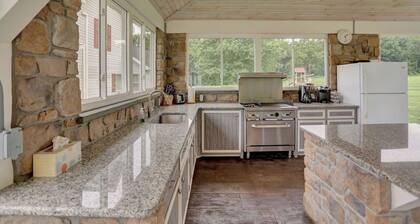 A luxury farm stay with something special for everyone in your group! Volleyball, baseball, pickleball, outdoor kitchen with pavilion, a private pond and dock for swimming, and so much more!