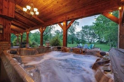 Secluded Cabin with Hot Tub, Game Room, Fire Pit, and More!