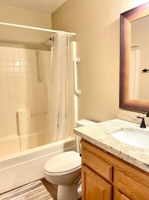 Hair dryer, towels, soap, shampoo